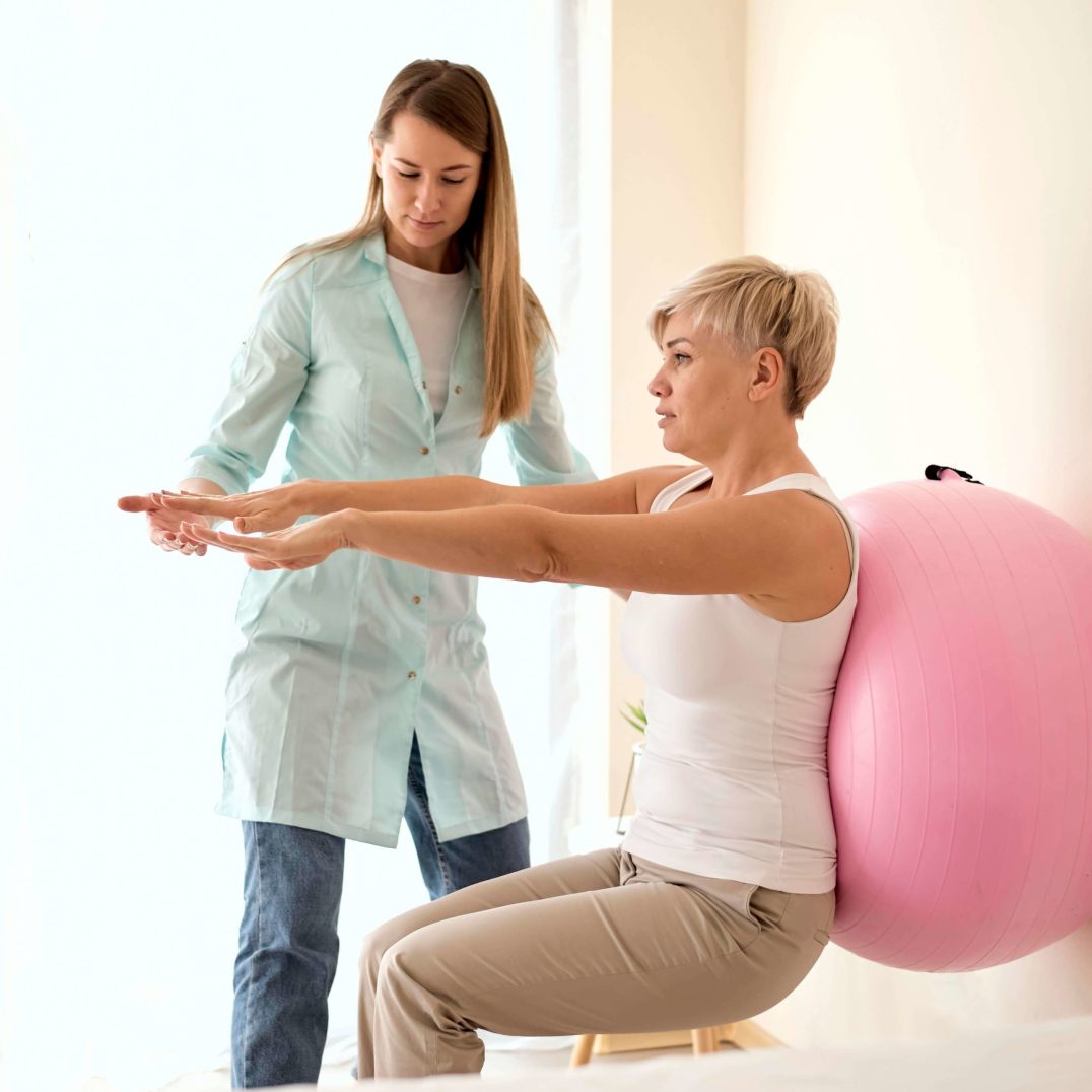 female-patient-undergoing-therapy-with-physiotherapist (1)